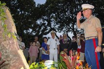 Col. Ronald A. Gridley, operations officer with U.S. Marine Corps Forces, Pacific, renders a salute during the War Memorial Plaque Rededication Ceremony at the Neal S. Blaisdell Center in Honolulu, Nov. 10, 2015. The Neal S. Blaisdell Center was dedicated as a war memorial in 1964, but its plaque went missing. The new plaque was dedicated to revitalize and preserve the war memorial heritage. (U.S. Marine Corps photo by Lance Cpl. Jonathan E. LopezCruet)