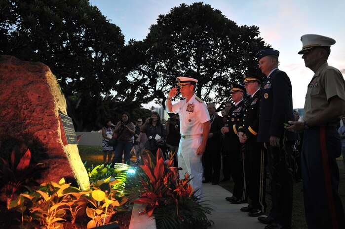 151110-N-IU636-696 HONOLULU (Nov. 10, 2015) Adm. Harry B. Harris Jr., commander of U.S. Pacific Command, salutes the new war memorial plaque unveiled at the Neal S. Blaisdell Center in Honolulu during a war memorial plaque rededication ceremony. The ceremony served to remember, preserve and rededicate the center as a war memorial with the unveiling of a new memorial plaque. The original plaque is believed to have gone missing some time by 1970. On Sept. 12, 1964, the Neal S. Blaisdell Center, formerly the Honolulu International Center, was dedicated as a living memorial to all of Hawaii's war veterans and war dead. (U.S. Navy photo by Mass Communication Specialist 2nd Class Johans Chavarro/Released)