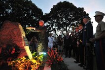 151110-N-IU636-703 HONOLULU (Nov. 10, 2015) Thomas K. Kaulukukui Jr., chairman of the board and managing trustee Queen Lili'uokalani Trust, places a traditional Hawaiian lei on the new war memorial plaque unveiled at the Neal S. Blaisdell Center in Honolulu during a war memorial plaque rededication ceremony. The ceremony served to remember, preserve and rededicate the center as a war memorial with the unveiling of a new memorial plaque. The original plaque is believed to have gone missing some time by 1970. On Sept. 12, 1964, the Neal S. Blaisdell Center, formerly the Honolulu International Center, was dedicated as a living memorial to all of Hawaii's war veterans and war dead. (U.S. Navy photo by Mass Communication Specialist 2nd Class Johans Chavarro/Released)
