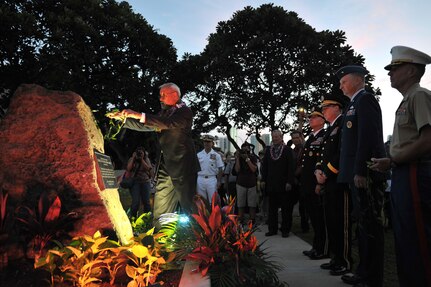 151110-N-IU636-703 HONOLULU (Nov. 10, 2015) Thomas K. Kaulukukui Jr., chairman of the board and managing trustee Queen Lili'uokalani Trust, places a traditional Hawaiian lei on the new war memorial plaque unveiled at the Neal S. Blaisdell Center in Honolulu during a war memorial plaque rededication ceremony. The ceremony served to remember, preserve and rededicate the center as a war memorial with the unveiling of a new memorial plaque. The original plaque is believed to have gone missing some time by 1970. On Sept. 12, 1964, the Neal S. Blaisdell Center, formerly the Honolulu International Center, was dedicated as a living memorial to all of Hawaii's war veterans and war dead. (U.S. Navy photo by Mass Communication Specialist 2nd Class Johans Chavarro/Released)