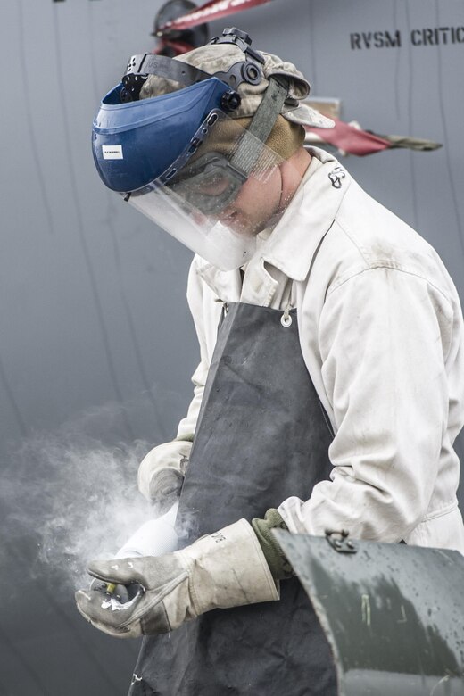 Senior Airman Keith Henry, 455th Expeditionary Aircraft Maintenance Squadron crew chief, deployed from Dyess Air Force Base, Texas, prepares liquid oxygen to service a C-130 Hercules at Bagram Air Field, Afghanistan, Nov. 11, 2015. The 455th EAMXS is responsible for repairing and maintaining military aircraft on Bagram, as well as performing preventative maintenance inspections. (U.S. Air Force photo/Tech. Sgt. Robert Cloys/RELEASED)
