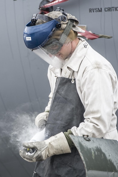 Senior Airman Keith Henry, 455th Expeditionary Aircraft Maintenance Squadron crew chief, deployed from Dyess Air Force Base, Texas, prepares liquid oxygen to service a C-130 Hercules at Bagram Air Field, Afghanistan, Nov. 11, 2015. The 455th EAMXS is responsible for repairing and maintaining military aircraft on Bagram, as well as performing preventative maintenance inspections. (U.S. Air Force photo/Tech. Sgt. Robert Cloys/RELEASED)