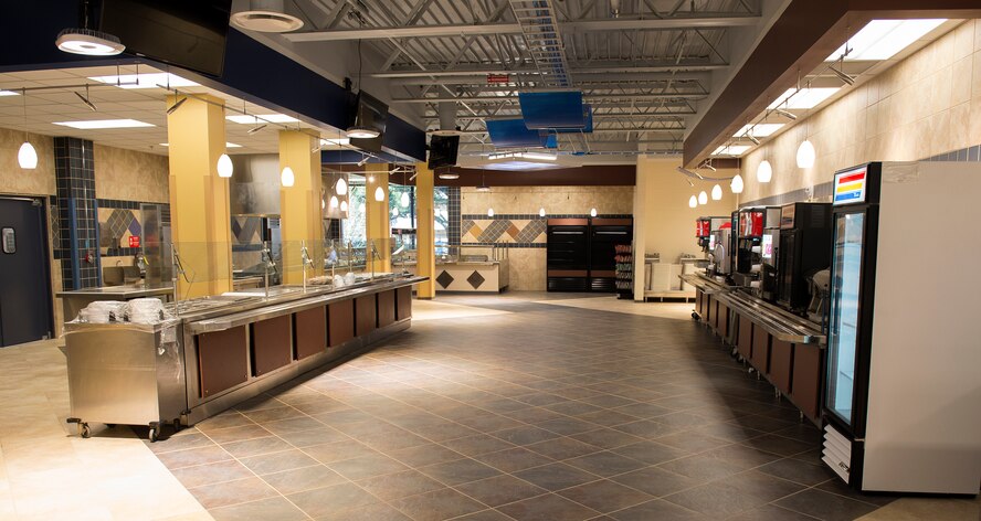 A salad bar and drink stations rest in the Georgia Pines Dining Facility, Nov. 13, 2015, at Moody Air Force Base, Ga. This new setup will streamline the process to getting food and drinks from one side of the facility to the other. (U.S. Air Force photo/Tech. Sgt. Zachary Wolf)