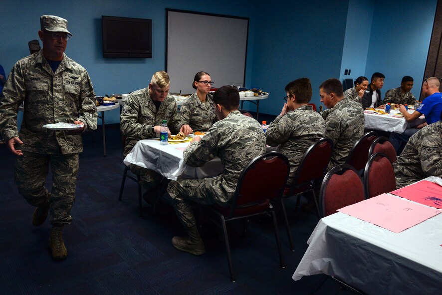 U.S. Air Force Chief Master Sgt. Maxie Gainey, 347th Rescue Group chief enlisted manager, serves Airmen during the Airmen’s Thanksgiving Luncheon, Nov. 13, 2015, at Moody Air Force Base, Ga. As a member of the Moody Chief Group, Gainey says he believes every Airman counts.  He coordinated the luncheon as a way to demonstrate leadership’s commitment to serving Airmen. (U.S. Air Force photo by Airman 1st Class Janiqua P. Robinson/Released)