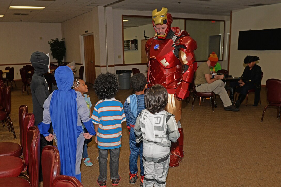 Douglas Rocky Melvin, a Goldsboro, North Carolina native, models as ‘Iron Man’ as he speaks with children during the inaugural Seymour Johnson Comic Expo, Nov. 7, 2015, at Seymour Johnson Air Force Base, North Carolina. (U.S. Air Force photo/Airman 1st Class Ashley Williamson)