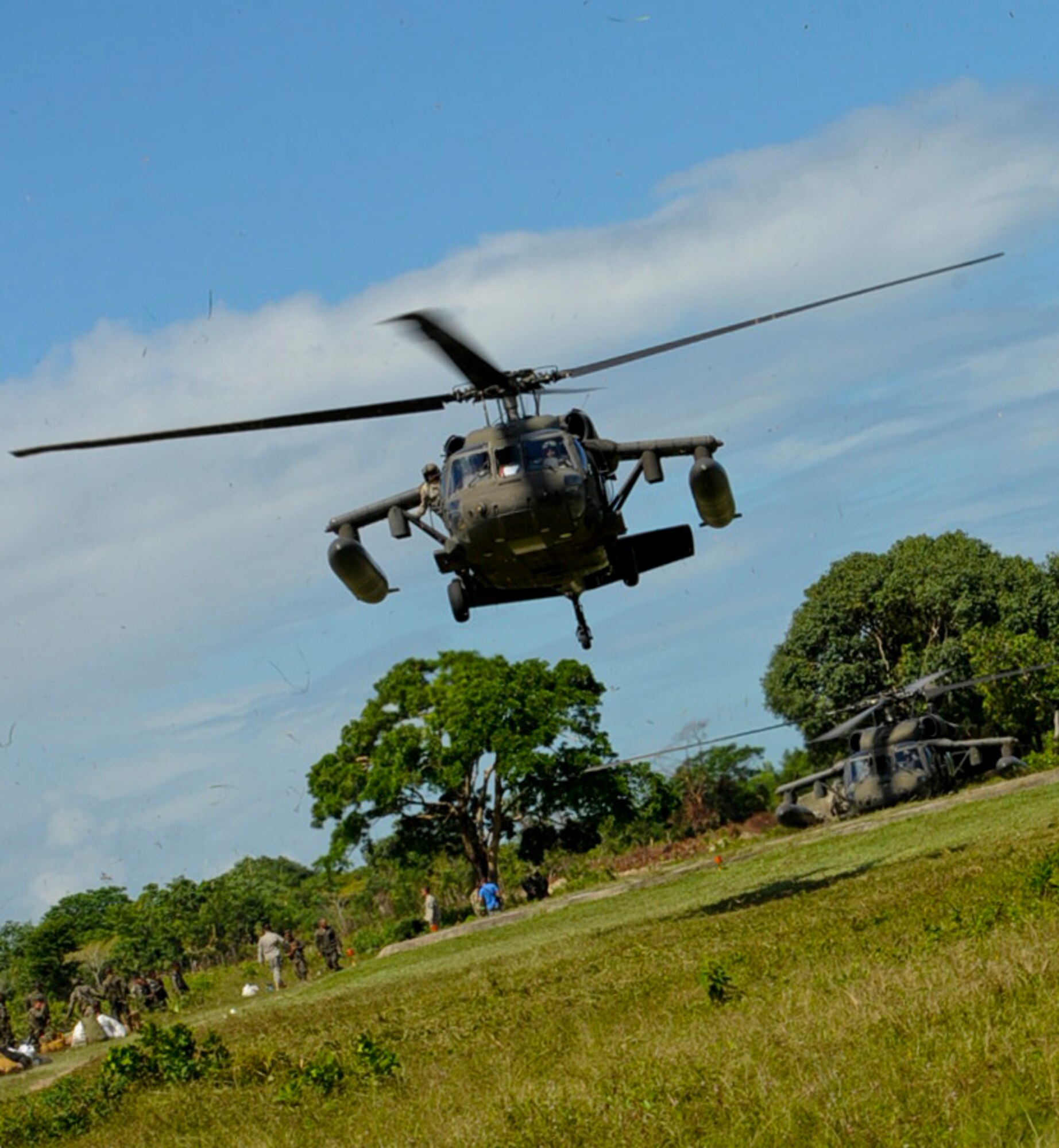 A U.S. Army UH-60 Blackhawk takes off with Honduran soldiers and their equipment, Nov. 5, 2015, in the Gracias a Dios department (state) of Honduras during Operation CARAVANA XIII, a troop rotation in the area. The helicopters, assigned to the 1-228th Aviation Regiment at Soto Cano Air Base, Honduras, fulfilled a Honduran military request for airlift to aid in Honduran freedom of movement in the area, helping them to combat drug trafficking and related criminal activities.. (U.S. Air Force photo by Capt. Christopher J. Mesnard/Released)
