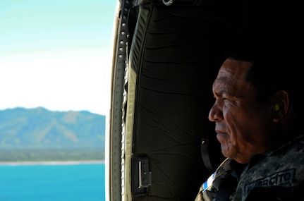 Honduran Army Lt. Col. Giron rides in a U.S. Army UH-60 Blackhawk, Nov. 5, 2015, en route to a Honduran naval base in the Gracias a Dios department (state) of Honduras. Giron served as the senior Honduran military representative during a troop rotation Joint Task Force-Bravo supported to give the Hondurans a greater freedom of access and movement in the district. (U.S. Air Force photo by Capt. Christopher J. Mesnard/Released)