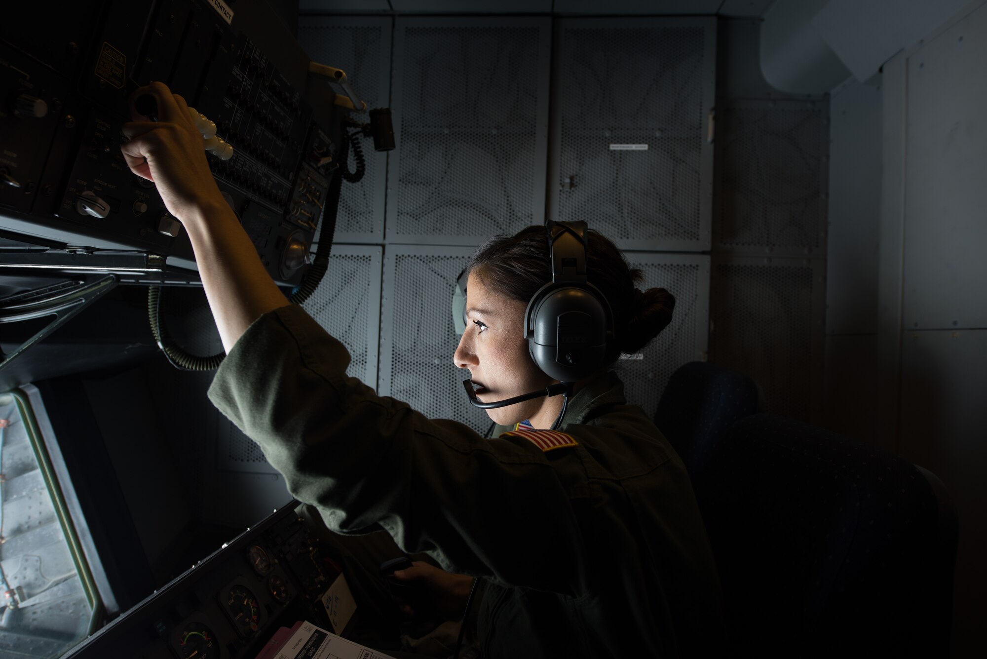 Tech. Sgt. Jessica Stockwell, 6th Air Refueling Squadron boom operator, refuels an F-15E Strike Eagle Nov. 5 from a Travis Air Force Base, Calif., KC-10 Extender. Stockwell was performing mission qualification training during exercise Gunfighter Flag near Mountain Home Air Force Base, Idaho. (U.S. Air Force photo by Airman 1st Class Amber Carter)