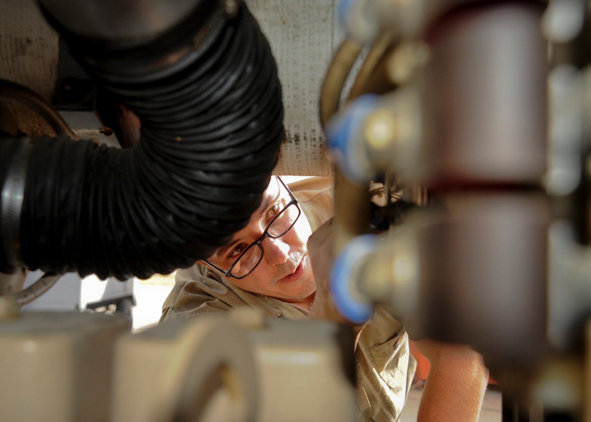 Senior Airman Joshua Farr, 22nd Maintenance Squadron aerospace ground equipment flight journeyman, inspects a generator, Nov. 5, 2015, at McConnell Air Force Base, Kan. The AGE flight monitors, inspects and maintains more than 500 pieces of equipment used across the entire 22nd Maintenance Group. (U.S. Air Force photo/Senior Airman Victor J. Caputo)