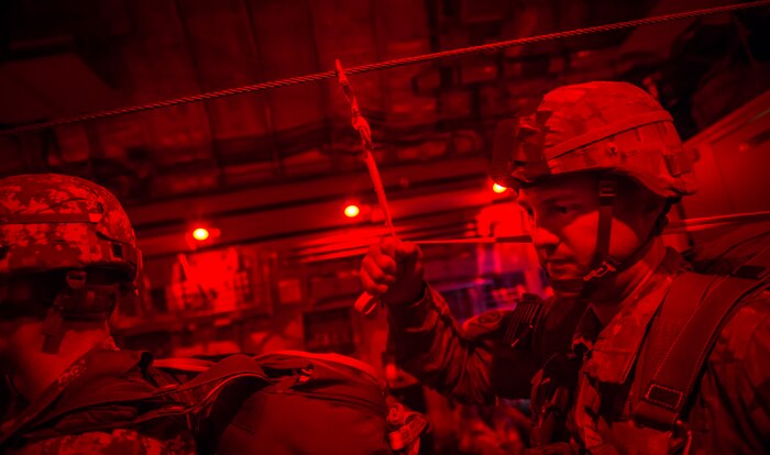 Soldiers with the 82nd Airborne Division wait for the green light to jump during Exercise Ultimate Reach 16, Nov. 7, 2015, while flying over a drop zone in North Carolina. Ultimate Reach is an annual U.S. Transportation Command-sponsored, live-fly exercise designed to test the ability of the 18th Air Force to plan and conduct strategic airdrop missions. Ultimate Reach 2015 partnered with the NATO Exercise Trident Juncture which was held in various locations across Europe. (U.S. Air Force photo/Airman 1st Class Clayton Cupit)