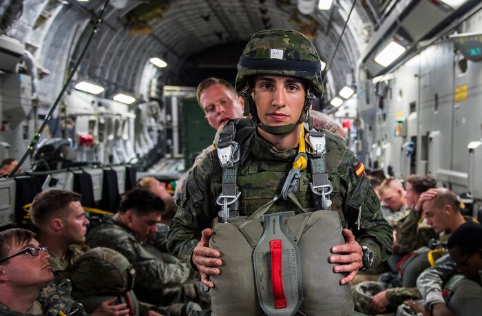 A Soldier from the 82nd Airborne Division checks the parachute of a Spanish military jumper, Nov. 3, 2015, during exercise Ultimate Reach 16-1. The exercise is an annual U.S. Transportation Command sponsored, live-fly exercise designed to test the ability of 18th Air Force to plan and conduct strategic airdrop missions with the 82nd Airborne Division. Four C-17 Globemaster IIIs from the 437th Airlift Squadron out of Joint Base Charleston, S.C., participated in a seven-ship formation to help airdrop more than 500 U.S. Army and Spanish military jumpers in Zaragoza, Spain. (U.S. Air Force photo/Senior Airman Jared Trimarchi)