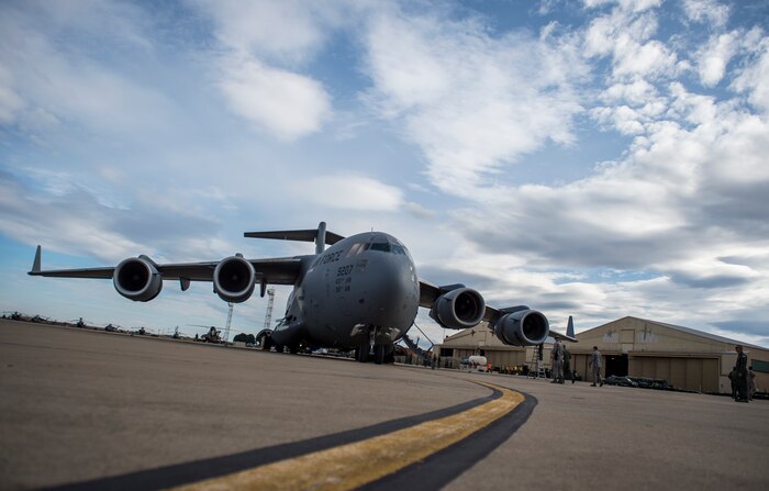 A C-17 Globemaster III from the 437th Airlift Wing stationed at Joint Base Charleston, S.C., sits on a flightline in Zaragoza, Spain, Nov. 4, 2015, during exercise Ultimate Reach 16-1. The exercise is an annual U.S. Transportation Command sponsored, live-fly exercise designed to test the ability of 18th Air Force to plan and conduct strategic airdrop missions with the 82nd Airborne Division. Four C-17 Globemaster IIIs from the 437th Airlift Squadron out of Joint Base Charleston, S.C., participated in a seven-ship formation to help airdrop more than 500 U.S. Army and Spanish military jumpers in Zaragoza, Spain. (U.S. Air Force photo/Senior Airman Jared Trimarchi)