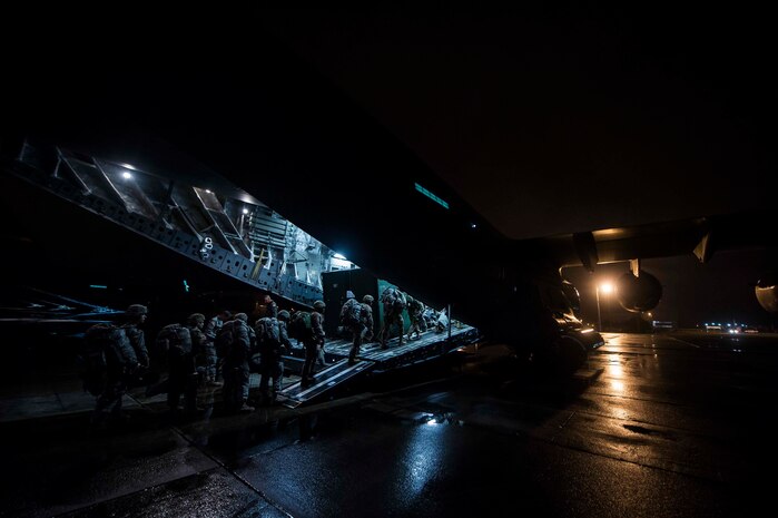 More than 60 Soldiers from the 82nd Airborne Division walk up the ramp of a C-17 Globemaster III at Pope Army Airfield, N.C., Nov. 3, 2015, during exercise Ultimate Reach 16-1. The exercise is an annual U.S. Transportation Command sponsored, live-fly exercise designed to test the ability of 18th Air Force to plan and conduct strategic airdrop missions with the 82nd Airborne Division. Four C-17 Globemaster IIIs from the 437th Airlift Squadron out of Joint Base Charleston, S.C., participated in a seven-ship formation to help airdrop more than 500 U.S. Army and Spanish military jumpers in Zaragoza, Spain. (U.S. Air Force photo/Senior Airman Jared Trimarchi)