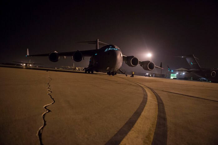 A C-17 Globemaster III sits on the flightline at Zaragoza, Spain, Nov. 7, 2015, during exercise Ultimate Reach 16-1. The exercise is an annual U.S. Transportation Command sponsored, live-fly exercise designed to test the ability of 18th Air Force to plan and conduct strategic airdrop missions with the 82nd Airborne Division. Four C-17 Globemaster IIIs from the 437th Airlift Squadron out of Joint Base Charleston, S.C., participated in a seven-ship formation to airdrop more than 500 U.S. Army and Spanish military jumpers. (U.S. Air Force photo/Senior Airman Jared Trimarchi)