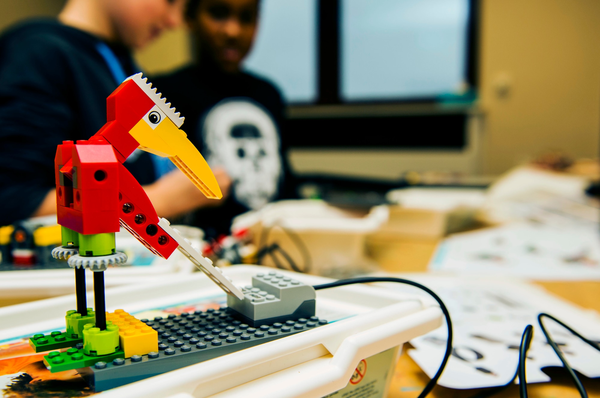 Jackson Sansosti, left, and Jayden Johnson work on building robots with Legos building blocks during the Power Hour in the School Age Program building at Spangdahlem Air Base, Germany, Nov. 10, 2015. Students are encouraged to do their homework, but are also given free rein to engage in other educational hobbies, such as robotics, literature and music. (U.S. Air Force photo by Airman 1st Class Timothy Kim/Released)