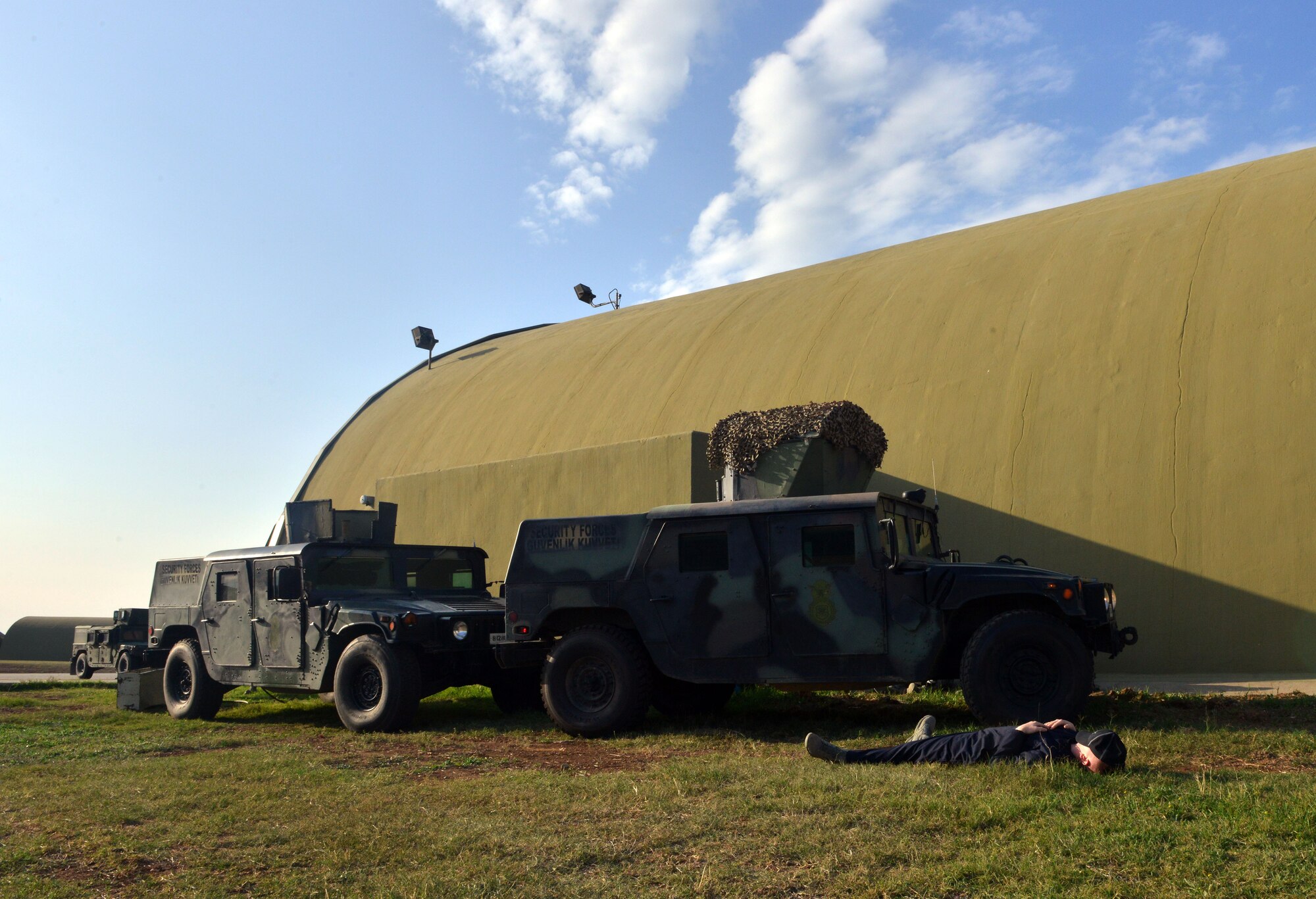 A simulated member of opposing forces lies on the ground after being neutralized by a member of the 39th Security Forces Squadron during a wing exercise Nov. 5, 2015, at Incirlik Air Base, Turkey. The 39th ABW holds regular exercises to test the readiness capabilities of the base and its Airmen. (U.S. Air Force photo by Staff Sgt. Michael Battles/Released)