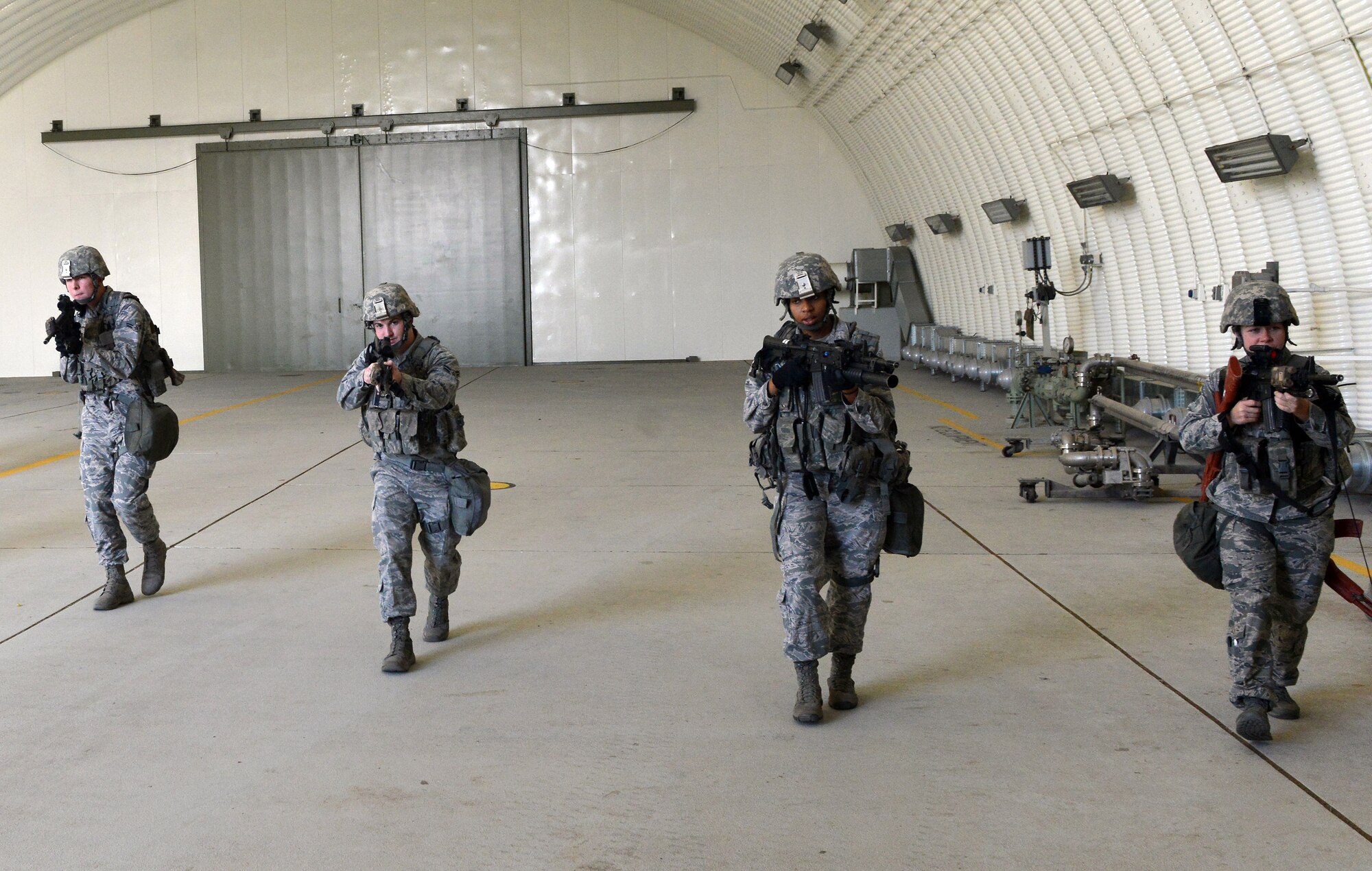 Members of the 39th Security Forces Squadron clear a building during a wing exercise Nov. 11, 2015, at Incirlik Air Base, Turkey. The 39th Air Base Wing holds exercises to test the response time and technical skills of Incirlik’s first responders. (U.S. Air Force photo by Staff Sgt. Michael Battles/Released)