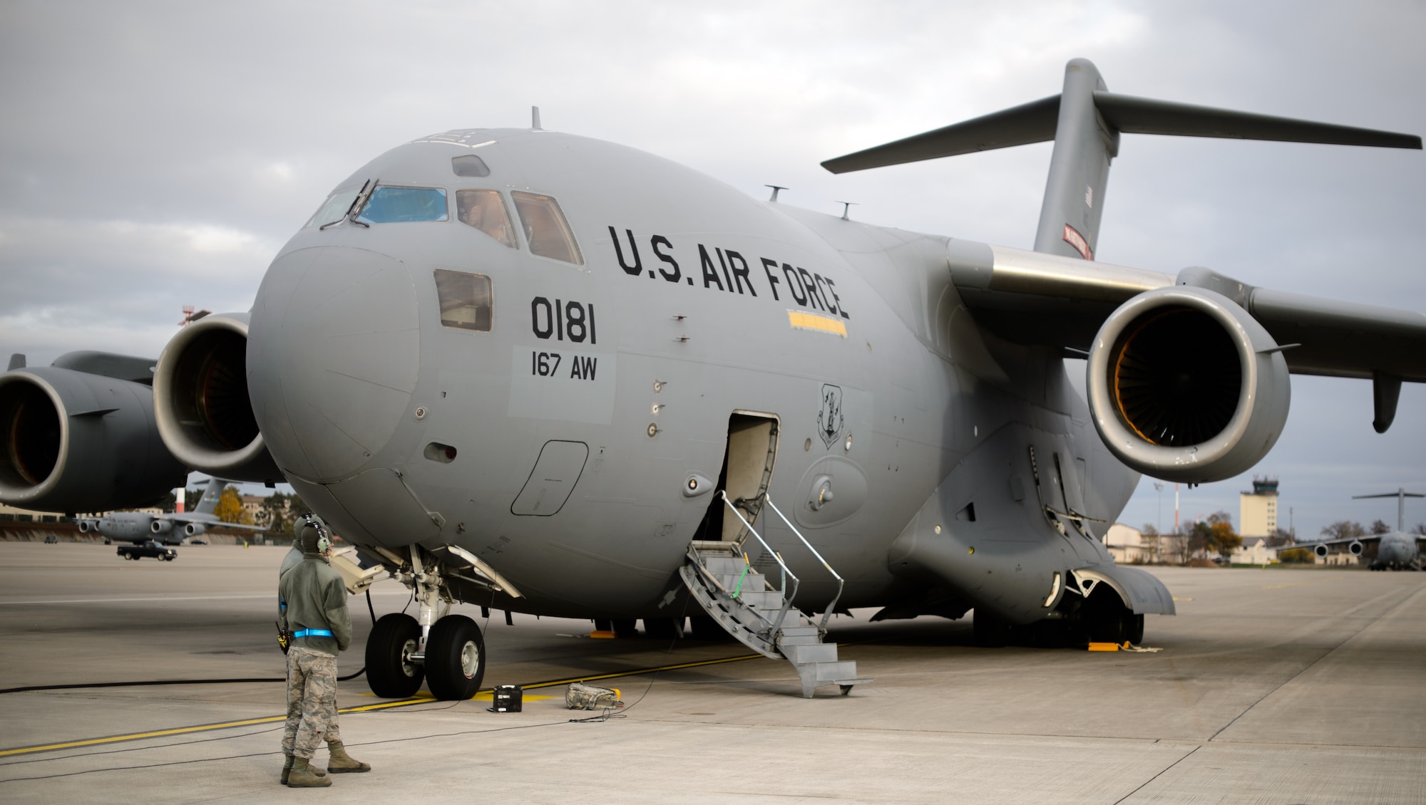 Crew chiefs from the 521st Air Mobility Operations Wing stand beside a C-17 Globemaster III prior to an aeromedical evacuation mission Nov. 10, 2015, at Ramstein Air Base, Germany. The 521st AMOW, including the 10th Expeditionary Aeromedical Evacuation Flight, conducts regular missions to the U.S. Central Command area of operation to return wounded warriors home. (U.S. Air Force photo/Staff Sgt. Armando A. Schwier-Morales)
