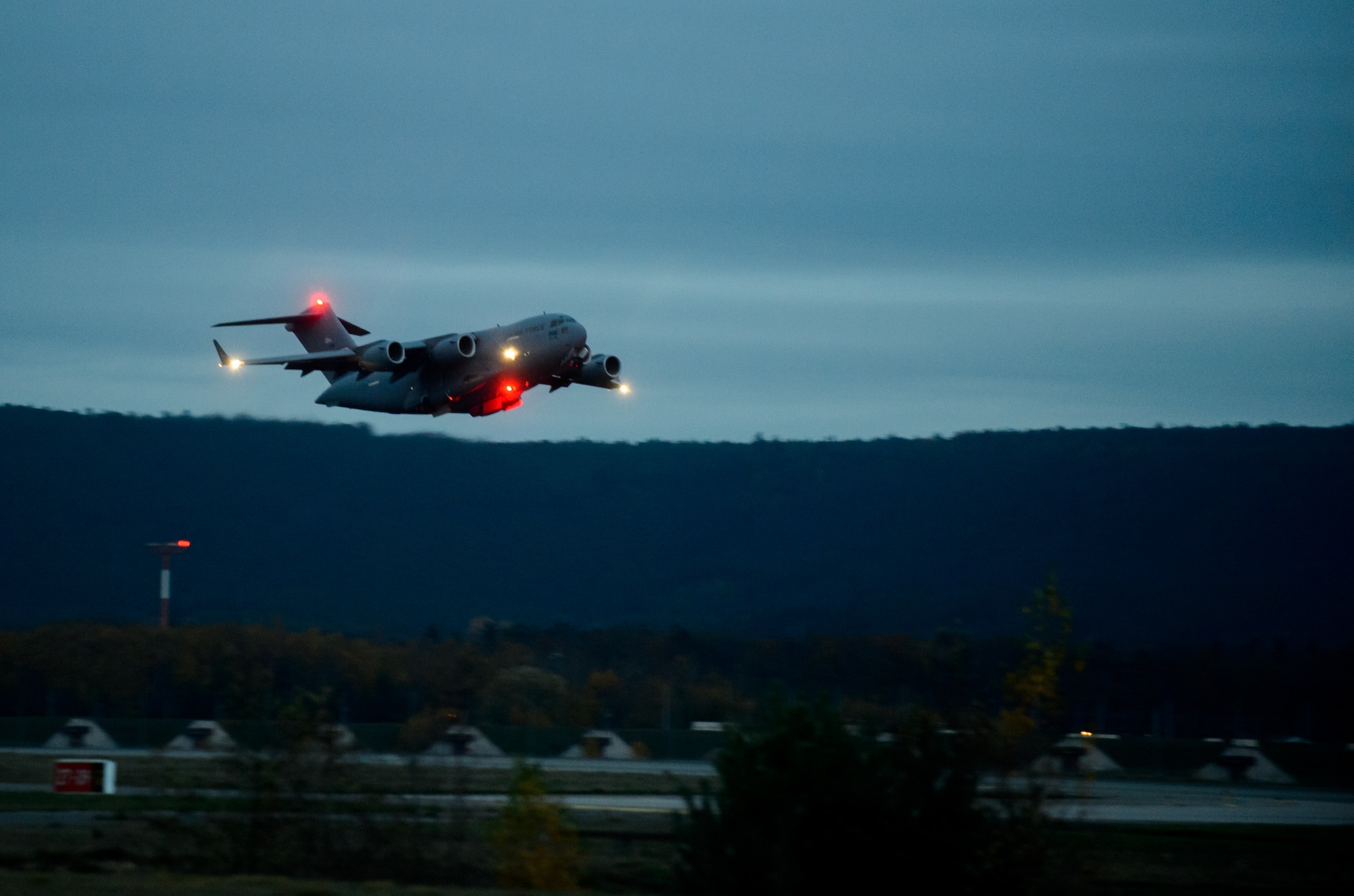 A C-17 Globemaster III carrying medical personnel from the 10th Expeditionary Aeromedical Evacuation Flight takes off Nov. 10, 2015, at Ramstein Air Base, Germany. The 10th EAEF is a mixture of active, reserve and guard Airmen deployed to Ramstein, constantly flying to war zones to retrieve patients needing higher levels of medical care. (U.S. Air Force photo/Staff Sgt. Armando A. Schwier-Morales)