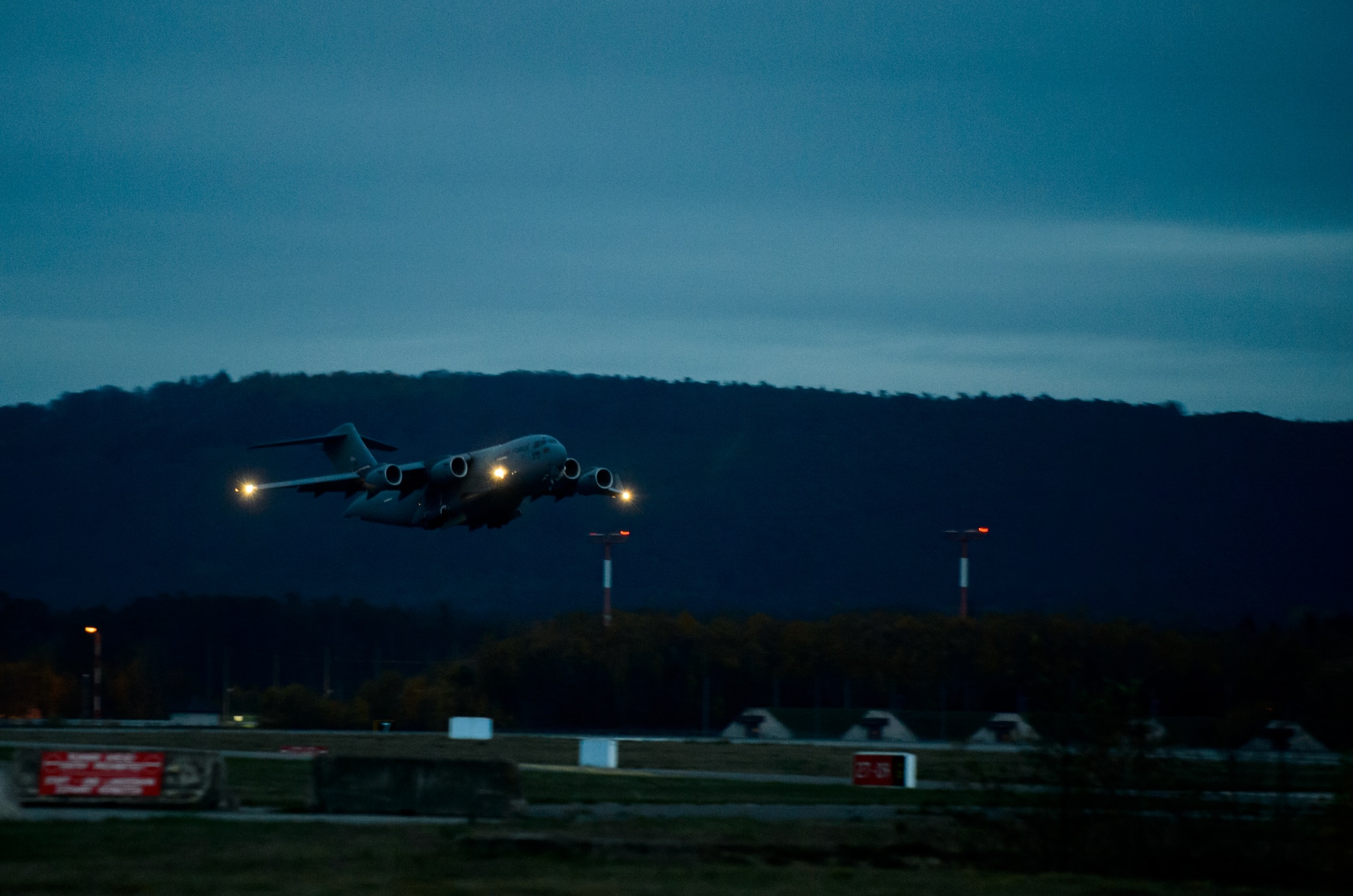 A C-17 Globemaster III carrying medical personnel from the 10th Expeditionary Aeromedical Evacuation Flight takes off Nov. 10, 2015, at Ramstein Air Base, Germany. The 10th EAEF is a mixture of active-duty, reserve and guard Airmen deployed to Ramstein, constantly flying to war zones to retrieve patients needing higher levels of medical care. (U.S. Air Force photo/Staff Sgt. Armando A. Schwier-Morales)