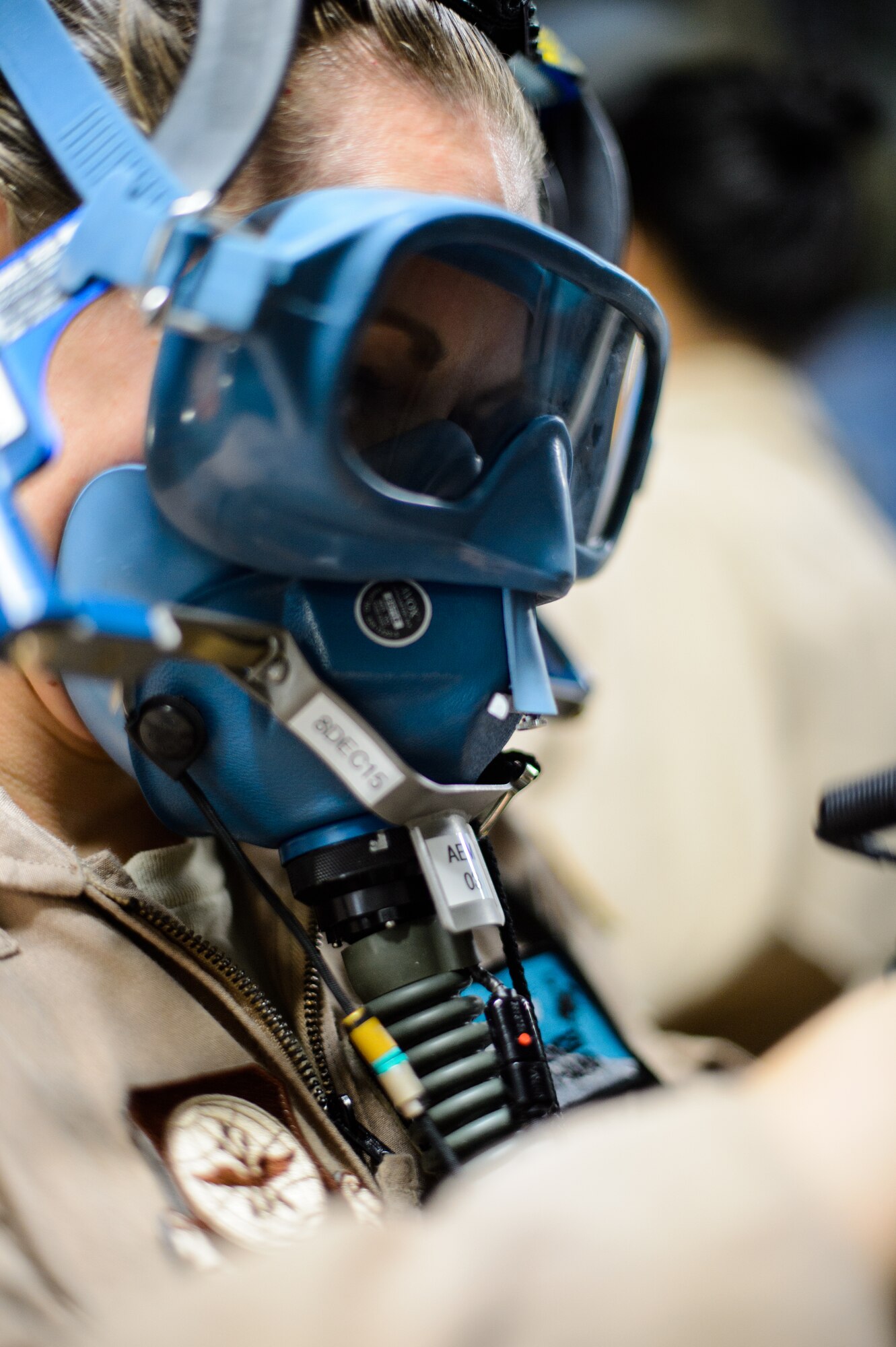 Senior Airman Beverly Spencer, 10th Expeditionary Aeromedical Evacuation Flight technician, tests her oxygen mask for leaks prior to a flight Nov. 10, 2015, at Ramstein Air Base, Germany. After configuring the inside of the C-17 Globemaster III into a flying ambulance, the Airmen test their equipment to ensure they can provide the best possible treatment while flying thousands of feet in the air. The 10th EAEF is a mixture of active-duty, reserve and guard Airmen deployed to Ramstein, constantly flying to war zones to retrieve patients needing higher levels of medical care. (U.S. Air Force photo/Staff Sgt. Armando A. Schwier-Morales)