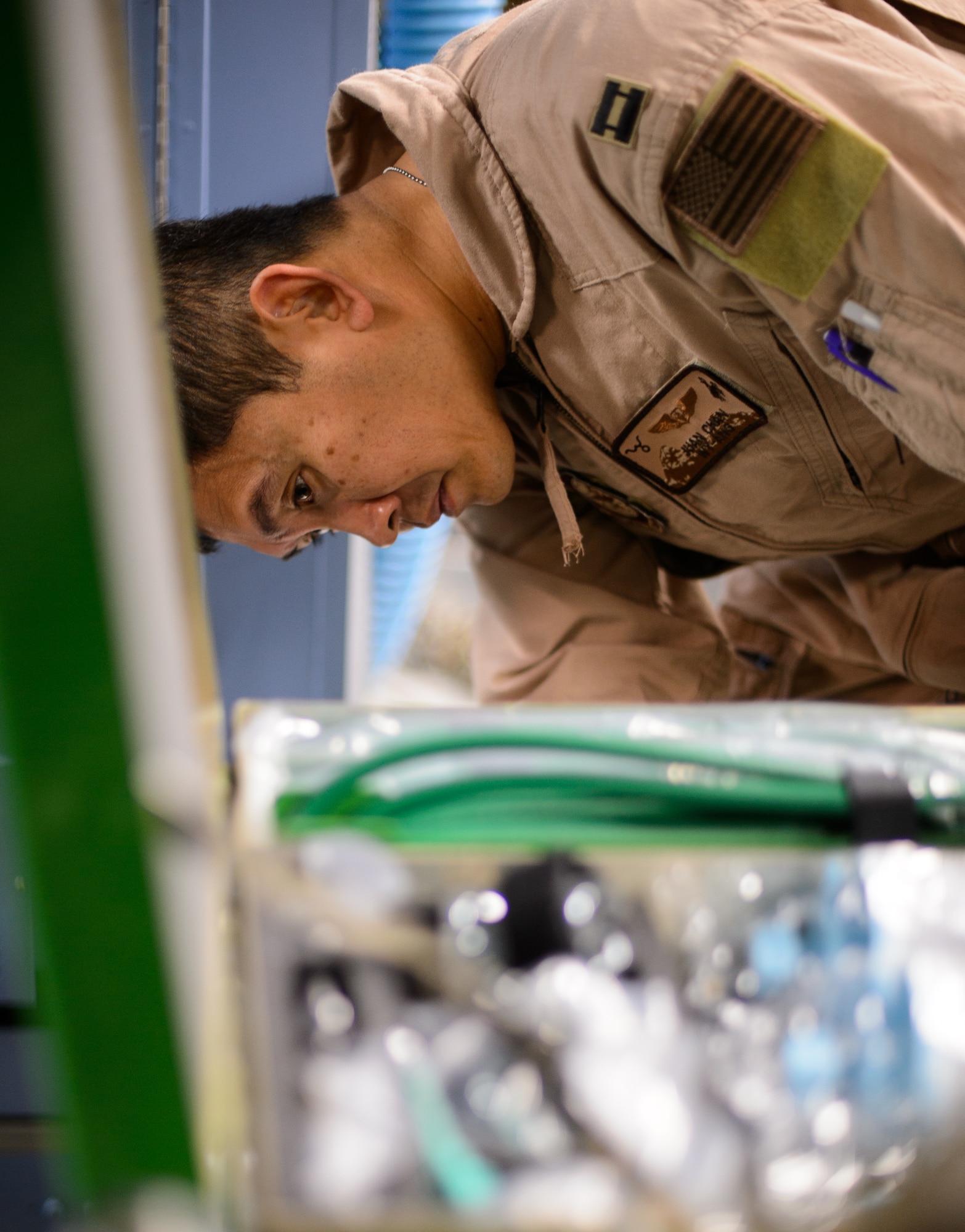 Capt. Juan Chan, 10th Expeditionary Aeromedical Evacuation Flight nurse, tests medical equipment prior to it becoming part of a C-17 Globemaster III flying ambulance Nov. 10, 2015, at Ramstein Air Base, Germany. Chan and several other Airmen brought injured service members from deployed locations to medical facilities in Germany and the U.S.  (U.S. Air Force photo/Staff Sgt. Armando A. Schwier-Morales)