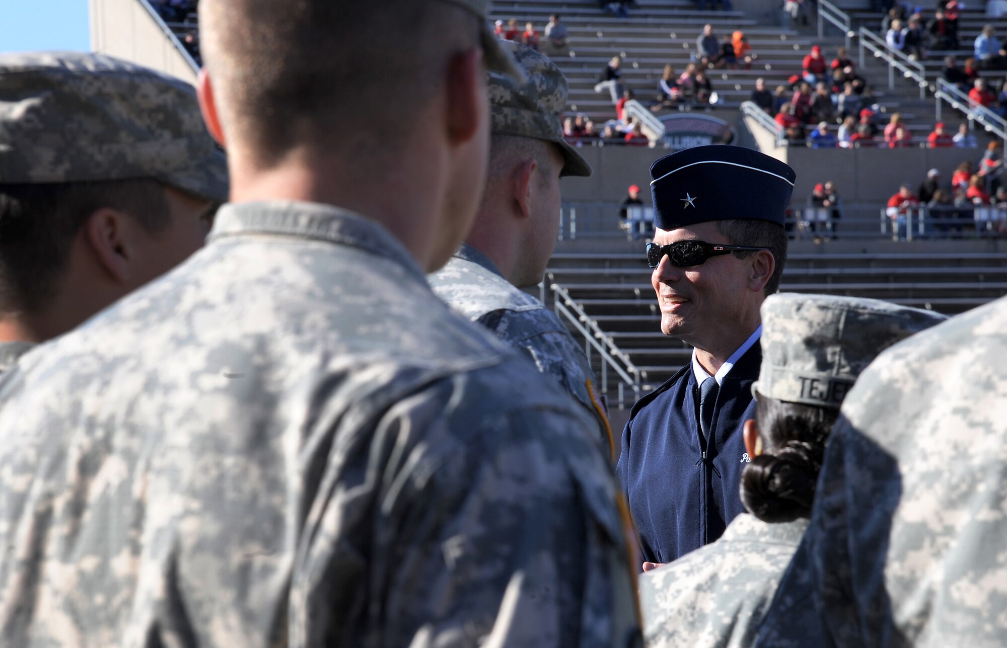 U.S. Air Force Brig. Gen. Paul Tibbets IV, the 509th Bomb Wing commander, speaks to Army ROTC cadets prior to a military appreciation football game at the University of Central Missouri (UCM) in Warrensburg, Mo., Nov. 7, 2015. UCM hosts a military appreciation game annually to express gratitude to members of the armed forces, past and present, for serving their country. (U.S. Air Force photo by Airman 1st Class Michaela R. Slanchik)
