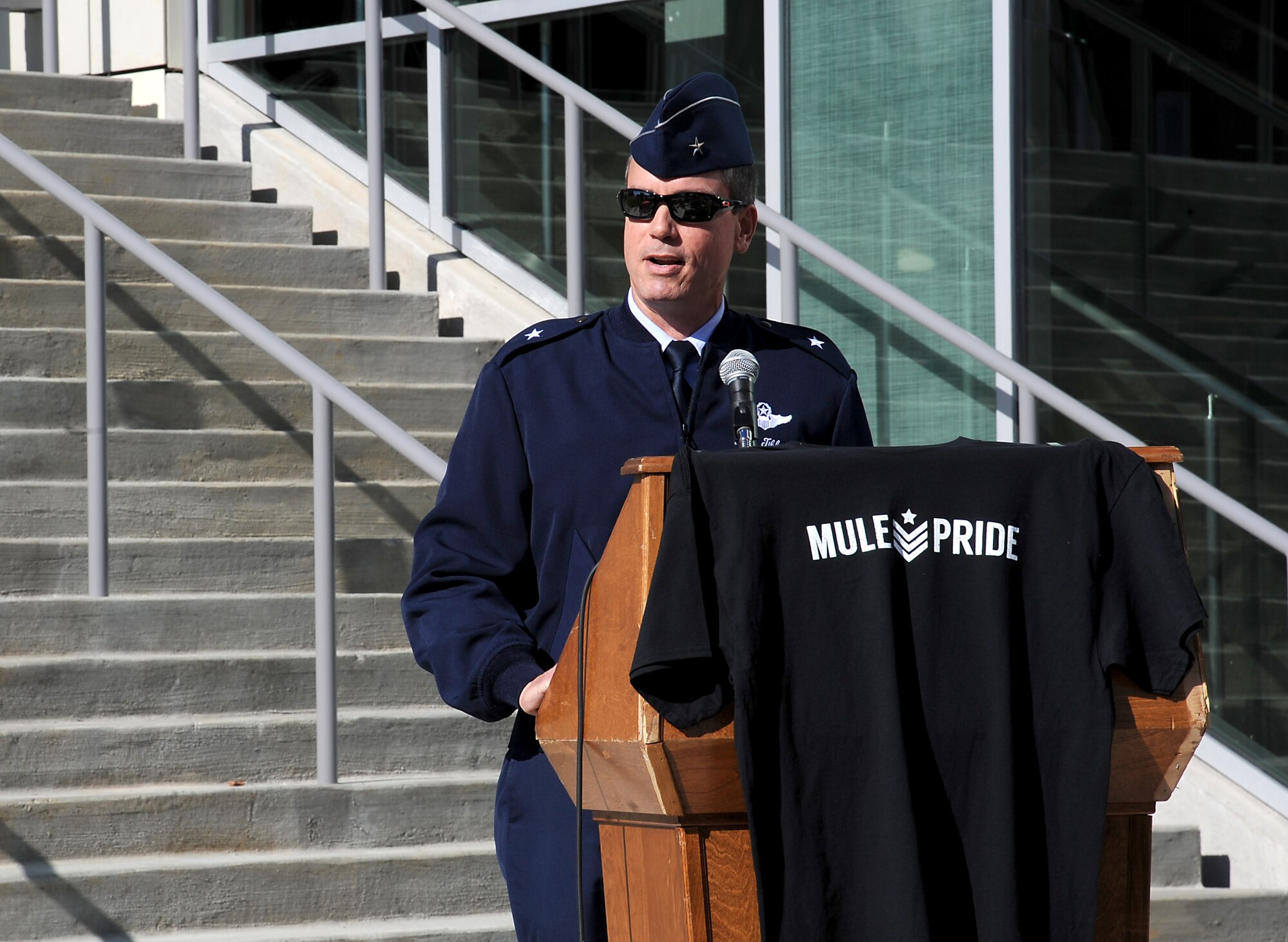 U.S. Air Force Brig. Gen. Paul Tibbets IV, the 509th Bomb Wing commander, speaks to a crowd before a military appreciation football game at the University of Central Missouri (UCM) in Warrensburg, Mo., Nov. 7, 2015. UCM hosts a military appreciation game annually to express gratitude to members of the armed forces, past and present, for serving their country. (U.S. Air Force photo by Airman 1st Class Michaela R. Slanchik)