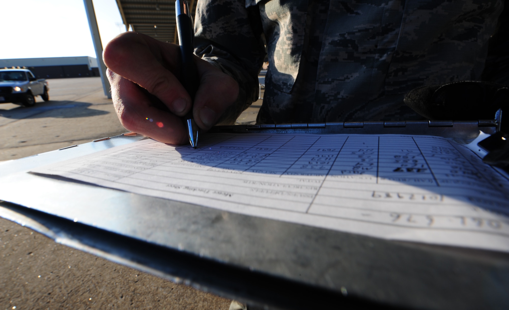 U.S. Air Force Airman 1st Class Jacob McSheffrey, a 509th Logistics Readiness Squadron fuels distribution operator, fills out an Air Force Form 1998, fuels billing transaction, at Whiteman Air Force Base, Mo., Nov. 3, 2015. This process ensures the appropriate agencies are billed for the fuels issued. (U.S. Air Force photo by Senior Airman Keenan Berry)