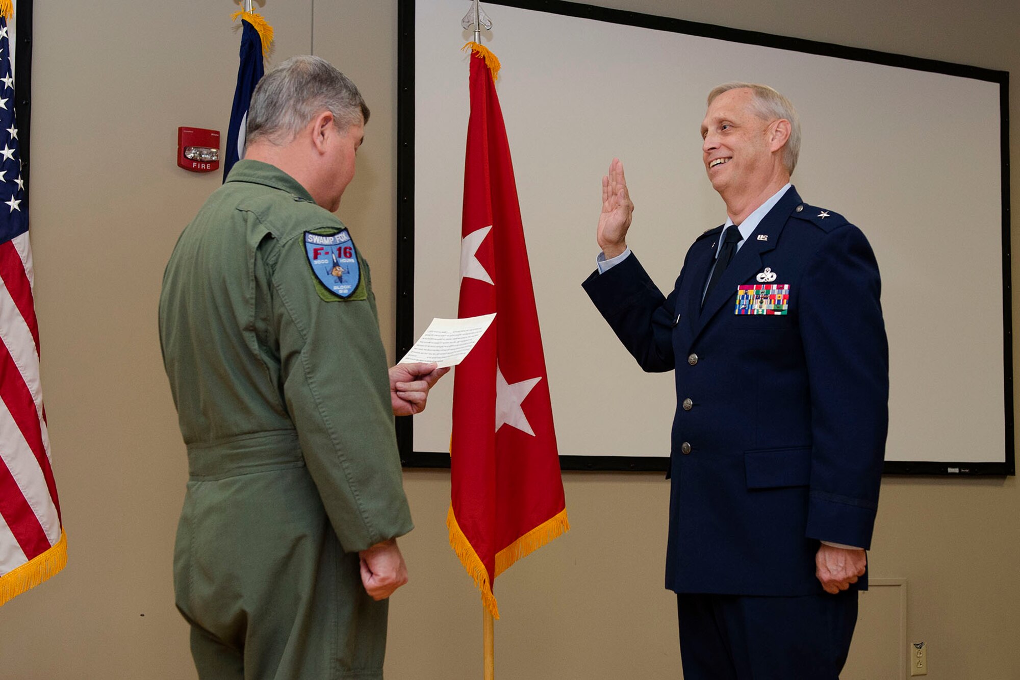 U.S. Air Force Col. Russell Rushe, Assistant Adjutant General for Air, Joint Forces Headquarters, S.C., is promoted to Brig. Gen. during a ceremony at McEntire Joint National Guard Base, Nov. 8, 2015. (U.S. Air National Guard photo by Tech. Sgt. Jorge Intriago/RELEASED)