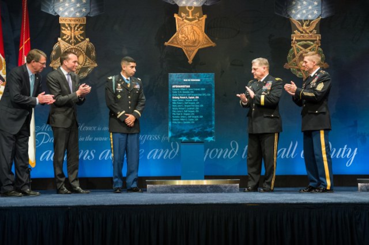 Defense Secretary Ash Carter, acting Army Secretary Eric K. Fanning, Medal of Honor recipient retired Army Capt. Florent A. Groberg, Army Chief of Staff Gen. Mark A. Milley and Sgt. Maj. of the Army Daniel A. Dailey unveil the plaque bearing Groberg's name during Groberg's Hall of Heroes induction ceremony at the Pentagon, Nov. 13, 2015. Groberg received the Medal of Honor for risking his life and going above and beyond the call of duty while serving as a personal security detachment commander for Task Force Mountain Warrior, 4th Infantry Brigade Combat Team, 4th Infantry Division, during combat operations in Afghanistan’s Kunar province on Aug. 8, 2012. U.S. Army photo by Staff Sgt. Steve Cortez