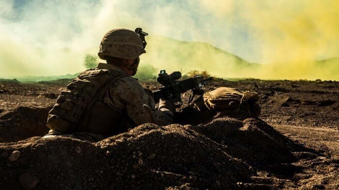 A Marine with Charlie Company, 1st Battalion, 8th Marine Regiment prepares to fire during the counterattack of the Battalion Assault Course, the culminating event for Integrated Training Exercise 1-16 aboard Marine Corps Air Ground Combat Center, Twentynine Palms, Calif., Nov. 6, 2015. The BAC integrates all elements of the Marine Air-Ground Task Force in order to defeat a large simulated enemy force. 