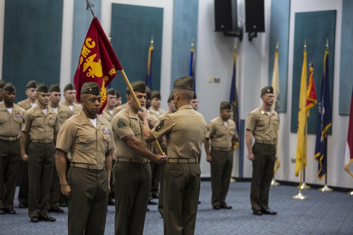 The Command Element Marine Forces Central Command Forward (CE MARFOR CENTCOM FWD) guidon is retired during the 5TH Marine Expeditionary Brigade (MEB)  activation ceremony aboard Naval Support Activity Bahrain, Oct. 15, 2015. Command Element Marine Forces Central Command Forward was re-designated as the 5TH MEB to more accurately reflect Marine Corps organizational doctrine, and will continue to provide a forward-deployed headquarters in the U.S. Central Command area of responsibility. (U.S. Marine Corps photo by Cpl. Sean Searfus 5TH MEB COMCAM / Released)