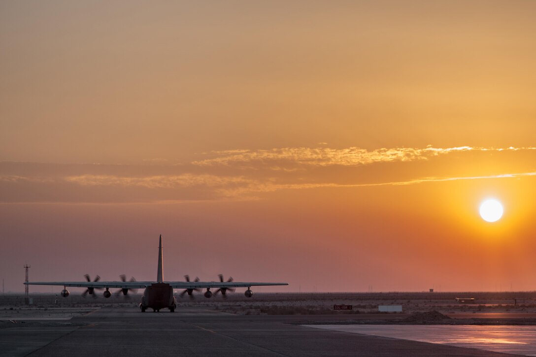 A U.S. Marine Corps Hercules aircraft taxis along a runway at sunset in the U.S. Central Command area of responsibility, Nov. 5, 2015. The four-engine turboprop military transport aircraft provides support to U.S. and coalition forces of Combined Joint Task Force – Operation Inherent Resolve. U. S. Marine Corps photo by Staff Sgt. Nathan O. Sotelo