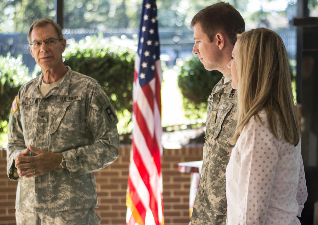 Retired Brig. Gen. Blake Williams delivers his remarks during the promotion ceremony for his son, Maj. Mark Williams on Oct. 18, 2015. Blake Williams and his sons, Mark Williams and Capt. Ryan Williams (not shown) have over four decades of service in the Army Reserve. Blake Williams previously served in the 108th Training Command (IET), the same unit both his sons are currently assigned to. (Photo by Sgt. Ken Scar, 108th Training Command (IET), Public Affairs)