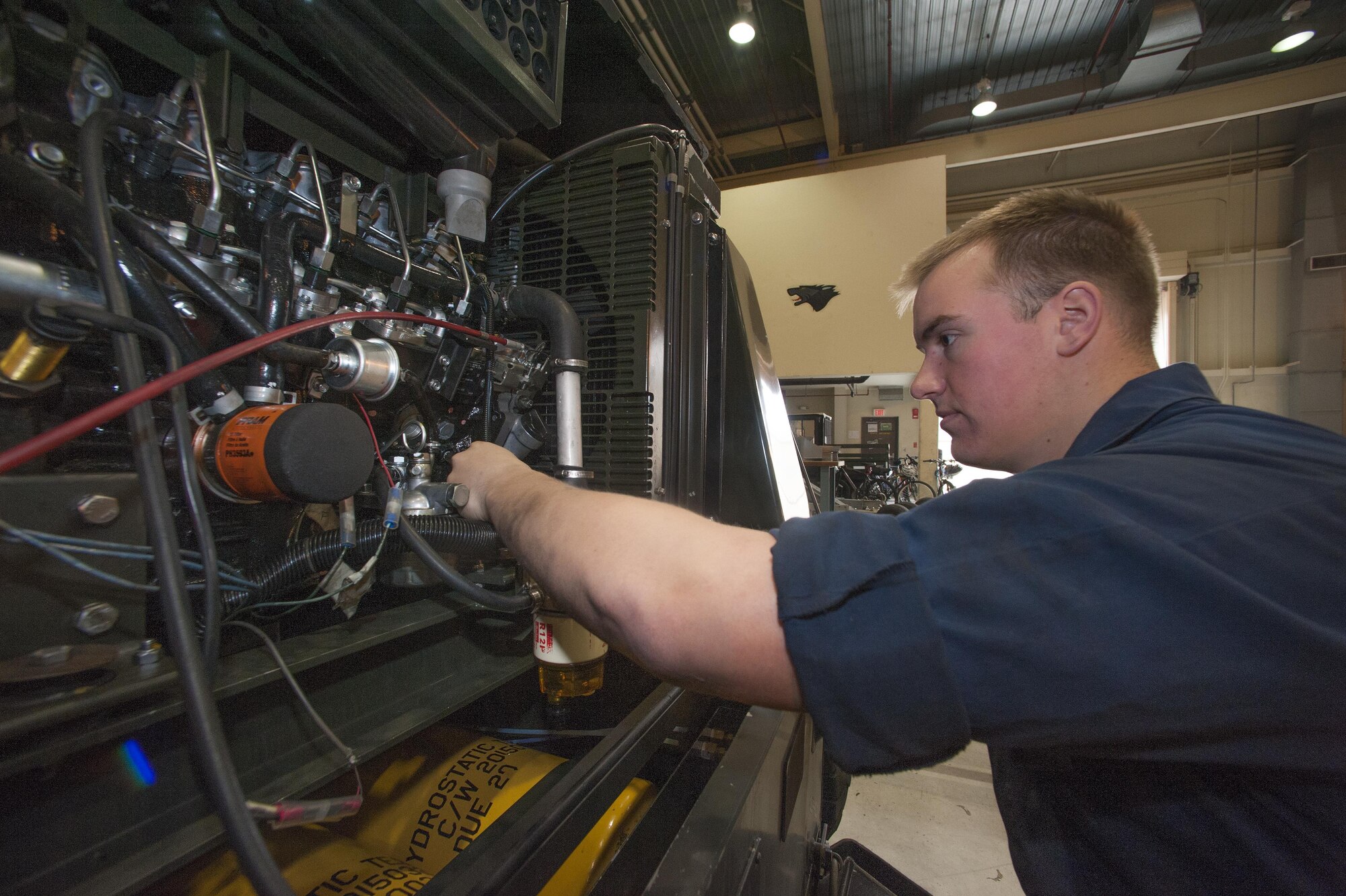 Senior Airman Nicholas Appenzeller, 8th Maintenance Squadron aerospace ground equipment journeyman, inspects a nitrogen cart at Kunsan Air Base, Republic of Korea, Nov. 10, 2015. This piece of equipment is used to pump nitrogen into the tires of an F-16 Fighting Falcon. (U.S. Air Force photo by Staff Sgt. Nick Wilson/Released)