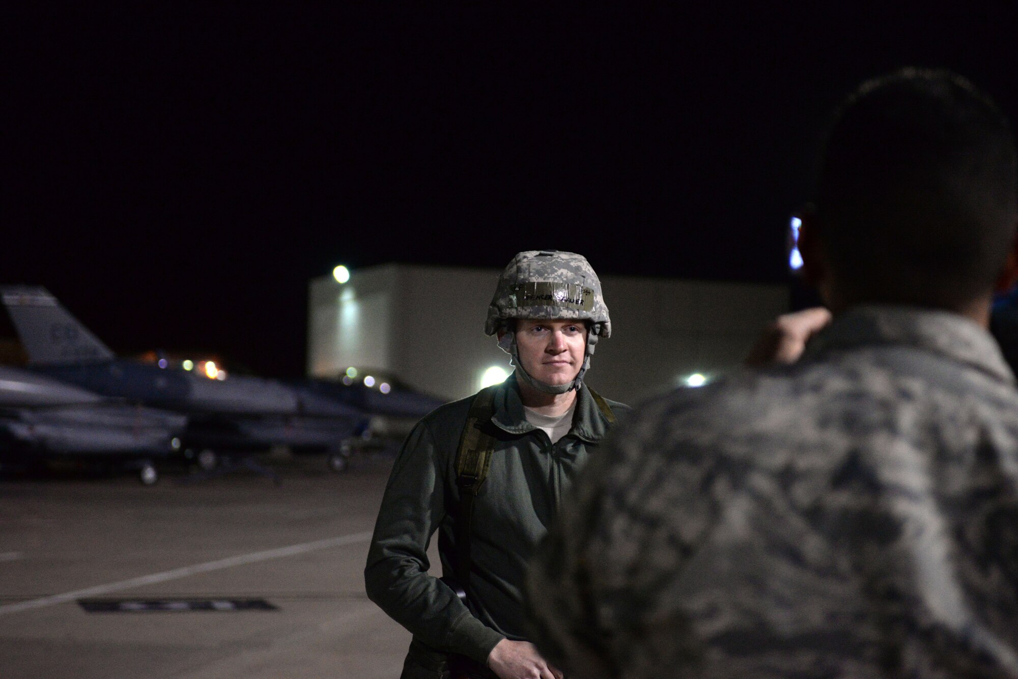 U.S. Air Force Staff Sergeant Spencer K. Brauer, assigned to 140th Weapons Maintenance, Colorado Air National Guard, participates in an interview discussing the progress of the wing wartime readiness inspection at Buckley Air Force Base, Colo., Oct. 16, 2015. Brauer works with a maintenance team on the flight line loading and unloading bombs on aircraft. (U.S. Air National Guard photo by Senior Airman Bobbie Reynolds)