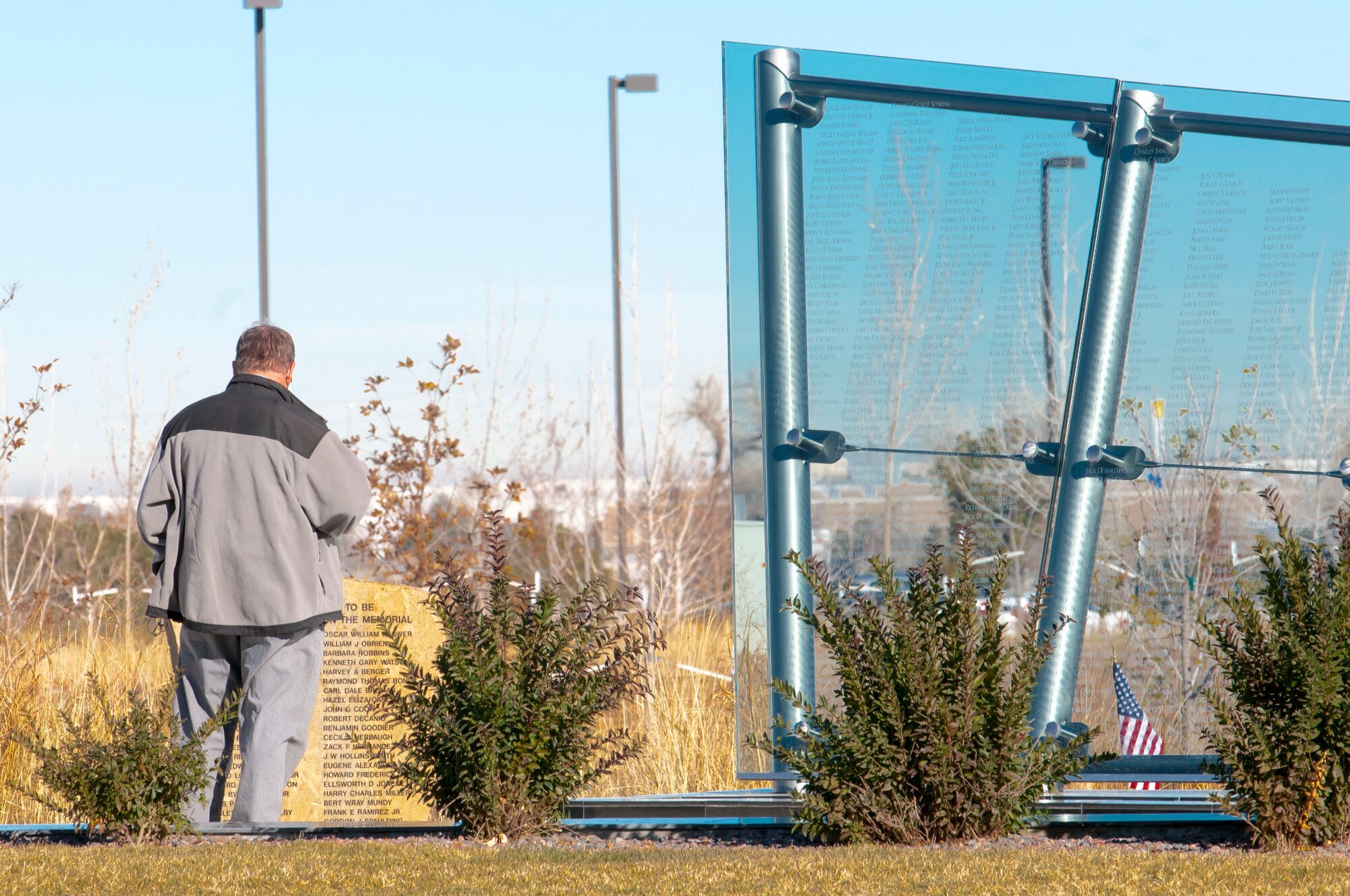 Jim Keesey, Comcast technician of 11 years, honors fallen service members by visiting the Colorado Freedom Memorial just outside Buckley Air Force Base, Nov. 14, 2015. Keesey has been an Aurora resident for more than 30 years. (U.S. Air National Guard Senior Airman Bobbie Reynolds)