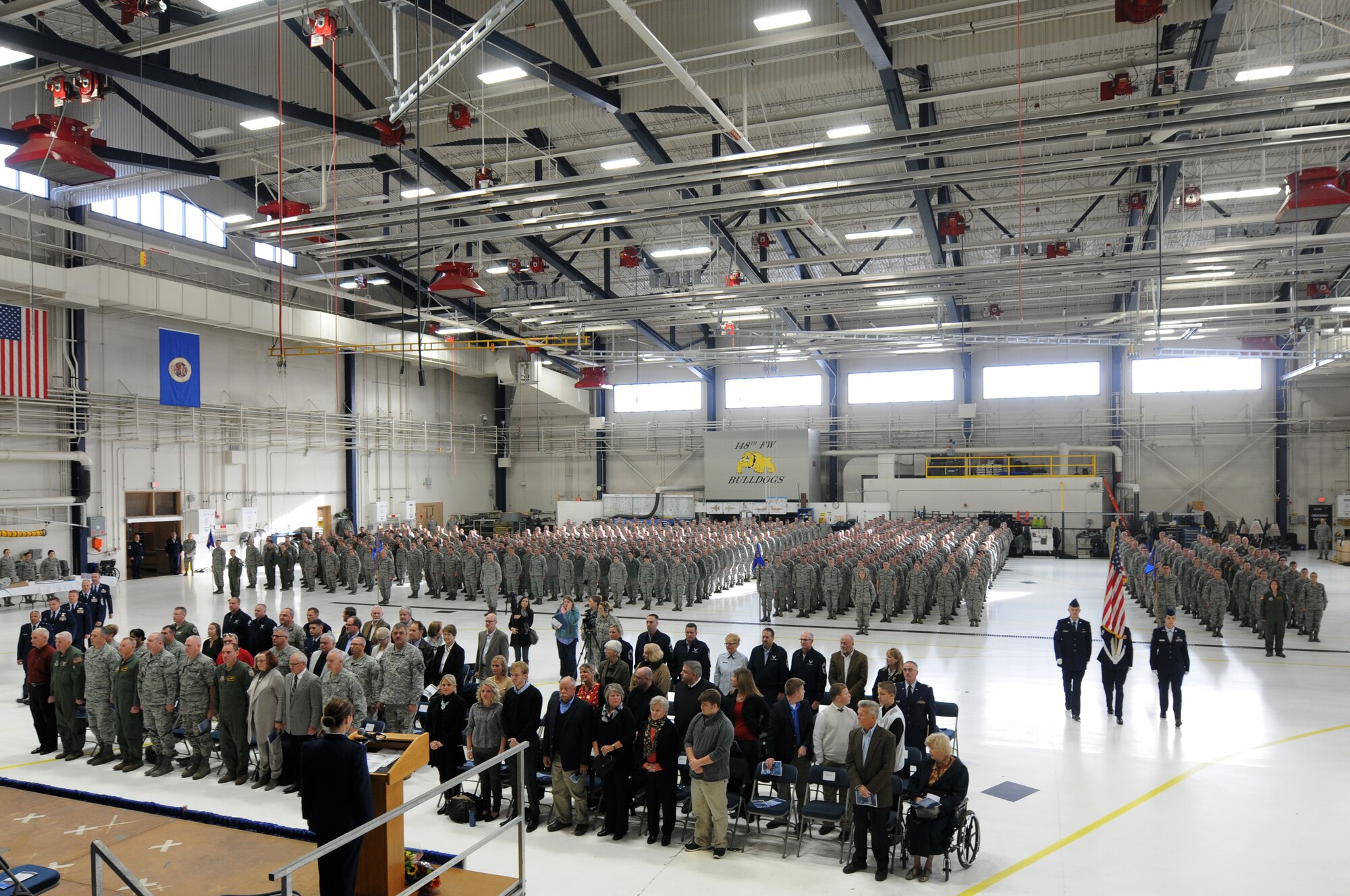 Airmen from the 148th Fighter Wing, Duluth, Minn. and guests stand at attention before Col. Jon S. Safstrom accepts command of the Wing, Nov. 14, 2015. Safstrom assumed command from Col. Frank H. Stokes who accepted a position at the National Guard Bureau, Arlington, Va. (U.S. Air Force photo by Tech. Sgt. Amie Muller/released)