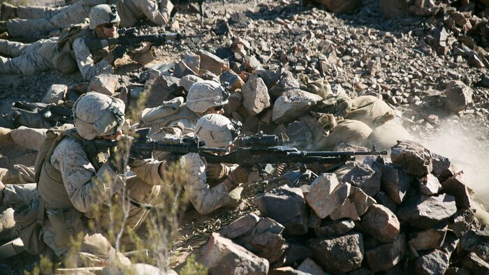 Marines with Golf Company, 2nd Battalion, 2nd Marine Regiment engage the enemy during a counterattack as part of Integrated Training Exercise 1-16 at Marine Air Ground Combat Center, Twentynine Palms, California, Nov. 11, 2015. The counterattack was part of the Battalion Assault Course, a three-day culminating event at the end of ITX.