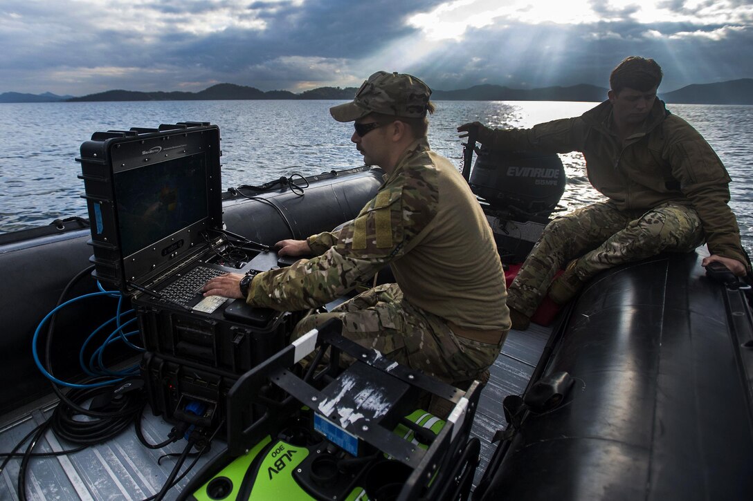 U.S. Navy Petty Officers 3rd Class Caden Gene Patrick Olson Johnson, left, and Jay Mawer conduct unmanned underwater vehicle sonar searches during exercise Clear Horizon 2015 on Commander Fleet Activities Chinhae, South Korea, Nov. 9, 2015. Johnson and Mawer are explosive ordnance disposal technicians assigned to Explosive Ordnance Disposal Mobile Unit 5. The annual exercise between the U.S. and South Korean navies focuses on increasing capabilities between ships, and on mine countermeasures in international waters surrounding the Korean peninsula. U.S. Navy photo by Petty Officer 2nd Class Daniel Rolston
