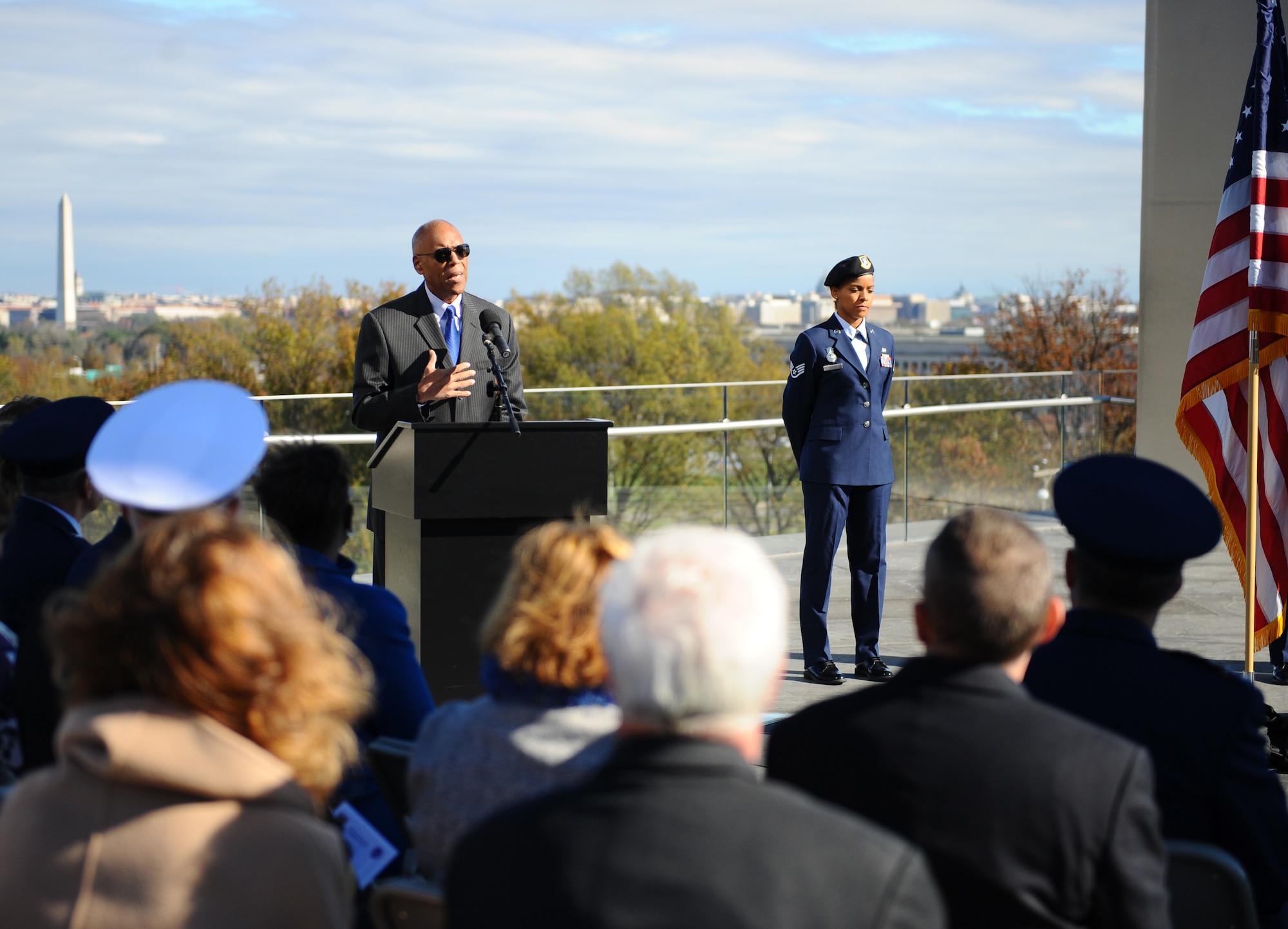 Retired Gen. Larry O. Spencer, the Air Force Association president, addresses the crowd during a Veterans Day ceremony beneath the spires of the Air Force Memorial Nov. 11, 2015. Veterans and their families reflected on the sacrifices made by the Soldiers, Sailors, Airmen and Marines, who have defended and continue to defend the U.S., its allies and coalition partners. (U.S. Air Force photo/Tech. Sgt. Bryan Franks)