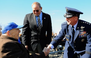 Air Force Vice Chief of Staff Gen. David L. Goldfein greets retired Lt. Col. Alfred Deptula, an aircraft engineer during World War II, after the Veterans Day ceremony at the Air Force Memorial Nov. 11, 2015. The event provided an opportunity for veterans and their families to reflect on the sacrifices made in service of the nation. (U.S. Air Force photo/Tech. Sgt. Bryan Franks)