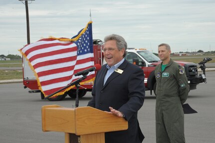 Mayor of Seguin, Don Keil, addresses the visitors, during the Joint Base San Antonio Seguin Auxiliary Airfield Open House, Nov. 13, 2015. JBSA-Randolph Auxiliary Airfield is used solely by the 560th Flying Training Squadron for preparing instructors for undergraduate pilot training T-38 training assignments.  The 560th primarily uses Seguin Auxfield for practice landings in a pilot controlled pattern called instead of FAA controllers. (U.S. Air Force photo by Joel Martinez/Released) 