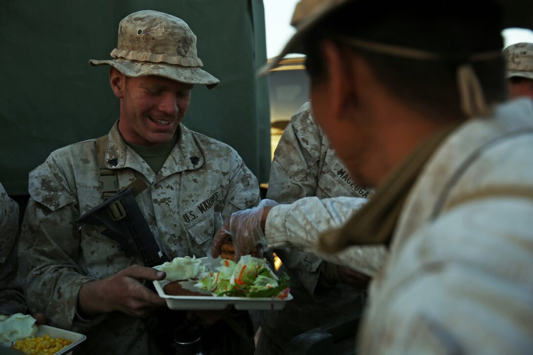Marines and Sailors assigned to Company A, 3rd Assault Amphibian Battalion, 1st Marine Division, celebrate the Marine Corps’ 240th birthday aboard Yuma Proving Grounds, Ariz., Nov. 10, 2015. The Marines and Sailors celebrated the birthday as a culminating event to the 18-day field operation.