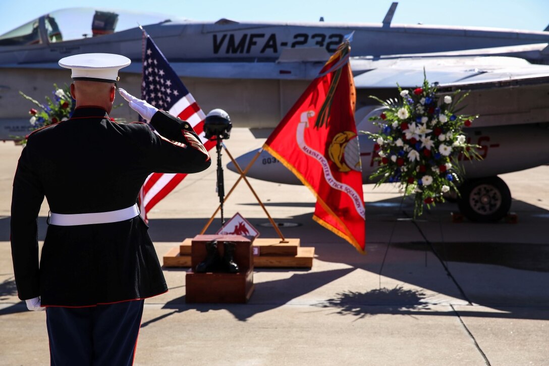 Sgt. Maj. Michael Walton, sergeant major of Marine Fighter Attack Squadron 232, salutes the battlefield cross during a memorial ceremony in honor of Maj. Taj Sareen, a pilot with VMFA-232, aboard Marine Corps Air Station Miramar, Calif., Nov. 13. Sareen died on Oct. 21 when his jet crashed during his return flight following a six-month deployment in support of Operation Inherent Resolve.