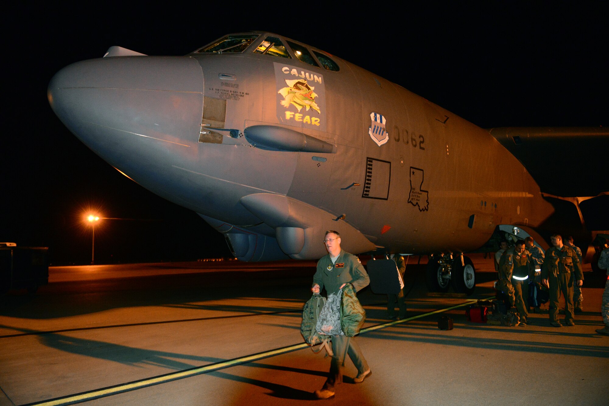 A B-52 Stratofortress crew unloads equipment following their return to Barksdale Air Force Base, La., Nov. 8, 2015, during exercise GLOBAL THUNDER 16. As part of U.S. Strategic Command’s (USSTRATCOM) Task Force 204, B-52s supports the command’s strategic deterrence and global strike missions by providing combat-ready forces capable of deploying air power to any area of the world. GLOBAL THUNDER is an annual U.S. Strategic Command training event that assesses command and control functionality in all USSTRATCOM mission areas and affords component commands a venue to evaluate their joint operational readiness. Planning for GLOBAL THUNDER 16 has been under way for more than a year and is based on a notional scenario with fictitious adversaries. USSTRATCOM, one of nine DoD unified combatant commands, relies on various task forces for the execution of its global missions, which also include space operations; cyberspace operations; joint electronic warfare; missile defense; intelligence, surveillance and reconnaissance; combating weapons of mass destruction; and analysis and targeting. (U.S. Air Force photo by Airman 1st Class Luke Hill)