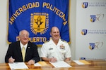 Polytechnic University of Puerto Rico President Ernesto Vazquez-Martinez and NSWC IHEODTD Commanding Officer Capt. Vincent Martinez renew Educational Partnership Agreement between the two organizations, Oct. 30.