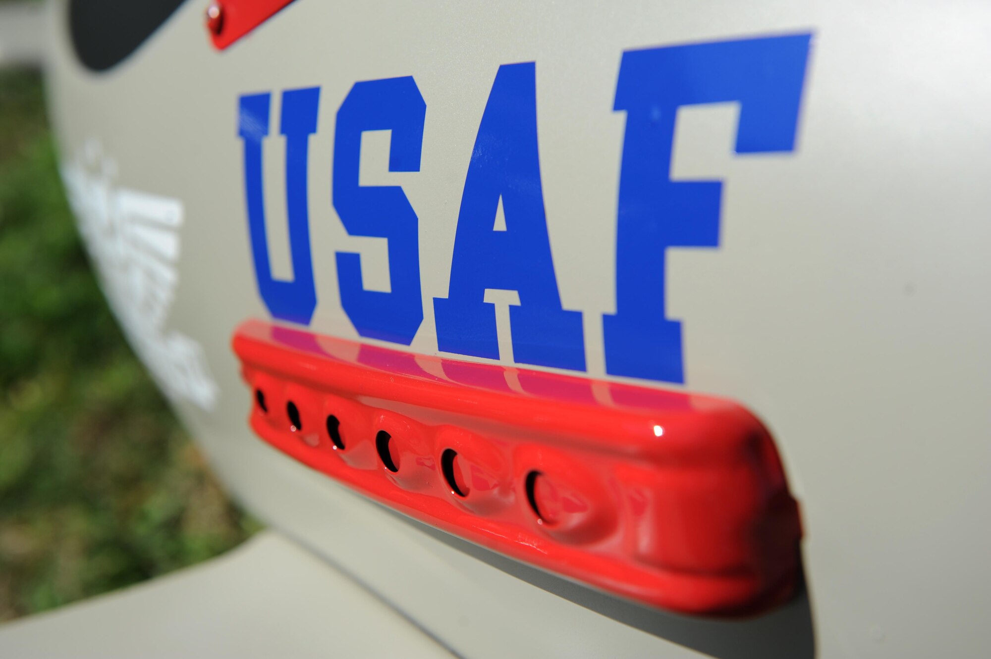 Refurbished pedal airplanes sit in front of the child development center Nov. 13, 2015, Keesler Air Force Base, Miss. The four pedal airplanes, refurbished by the Trainer Development Center, have been in storage for more than 10 years. (U.S. Air Force photo by Kemberly Groue)