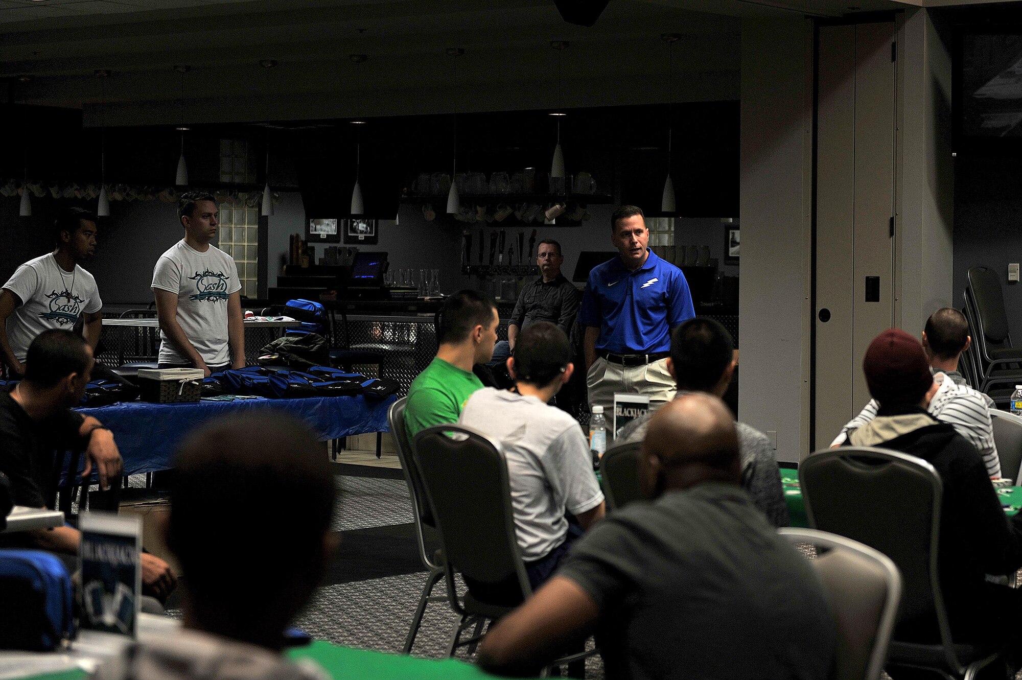 U.S Air Force Col. Michael Grunwald Jr., 17th Training Group Commander, speaks about sexual assault and how beneficial it is to utilize the programs available for Airmen during the 4th Annual Sexual Assault Prevention and Response Guys Night Out at the Event Center on Goodfellow Air Force Base, Texas, Nov. 11, 2015. Col. Grunwald was one of multiple guest speakers to speak about resiliency and sexual assault awareness. (U.S. Air Force photo by Airman 1st Class Caelynn Ferguson/Released)